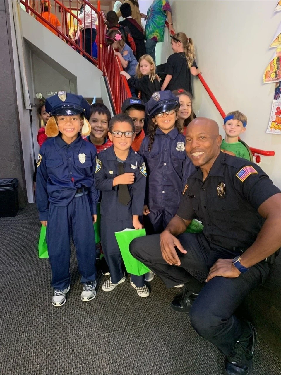 Founder Robert L. Releford with R.E.A.D. students at a career day